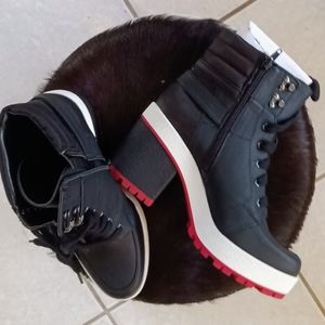 MIX #6 DENARI PLATFORM BOOTIE. FEATURES BLACK BOOT WITH RED ACCENTS & LUG SOLE.